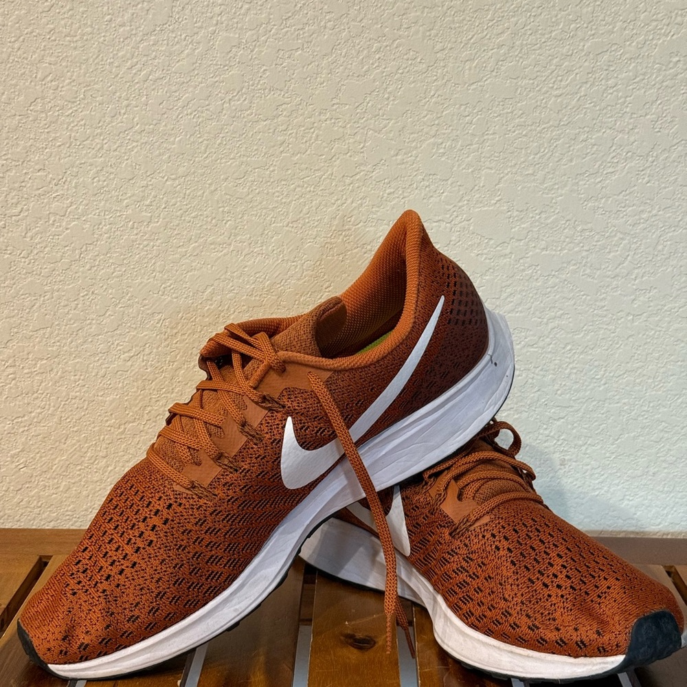 Nike Orange and White Athletic Shoes with Breathable Design